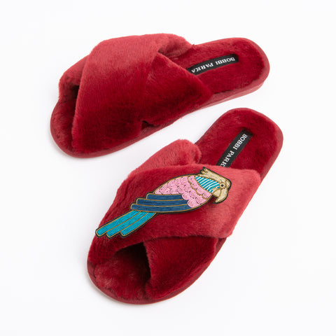 Bobbi Parka fluffy faux fur slippers with a crystal parrot brooch